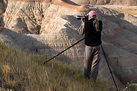 Rod Planck Photographing, Badlands National Park, South Dakota, Hand-holding Composition